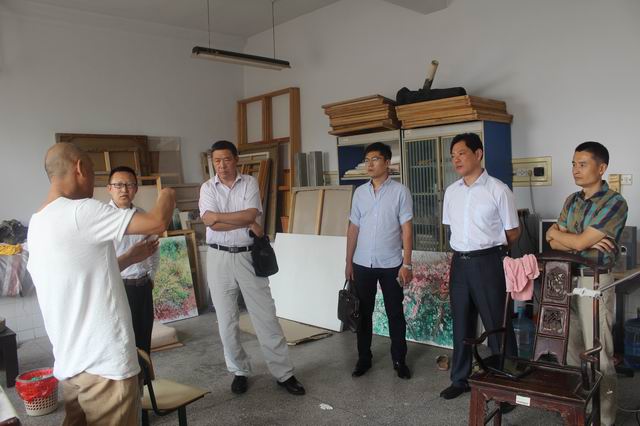 山东省美术馆副馆长、著名画家王建国一行应邀来悟空体育参观交流